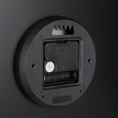 Brixen Wandklok 35,5 cm gouden achtergrond zwarte wijzers modern interieur