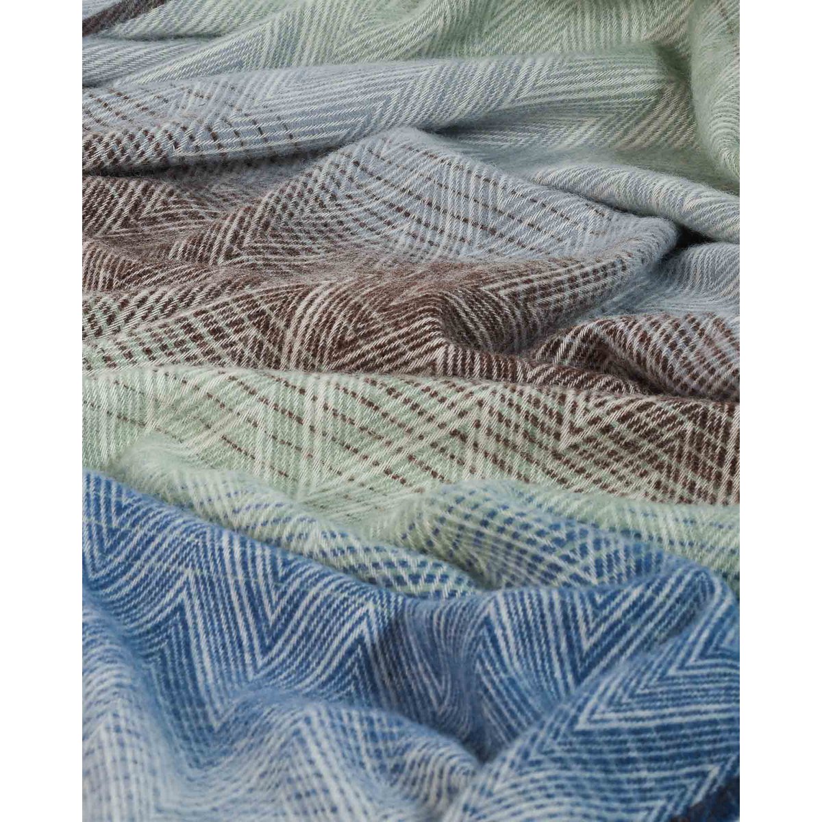 Wollen plaid Missoni Acqua 140x200 met zigzagpatroon in blauw en multicolor | Woonware